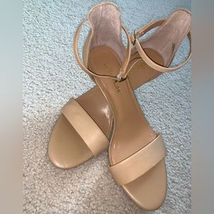 Size 7, 1-1.5” tan/cream heals - worn only once